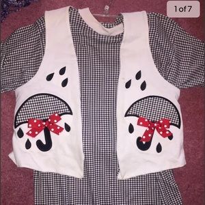 Linda Clark boutique top with vest umbrellas